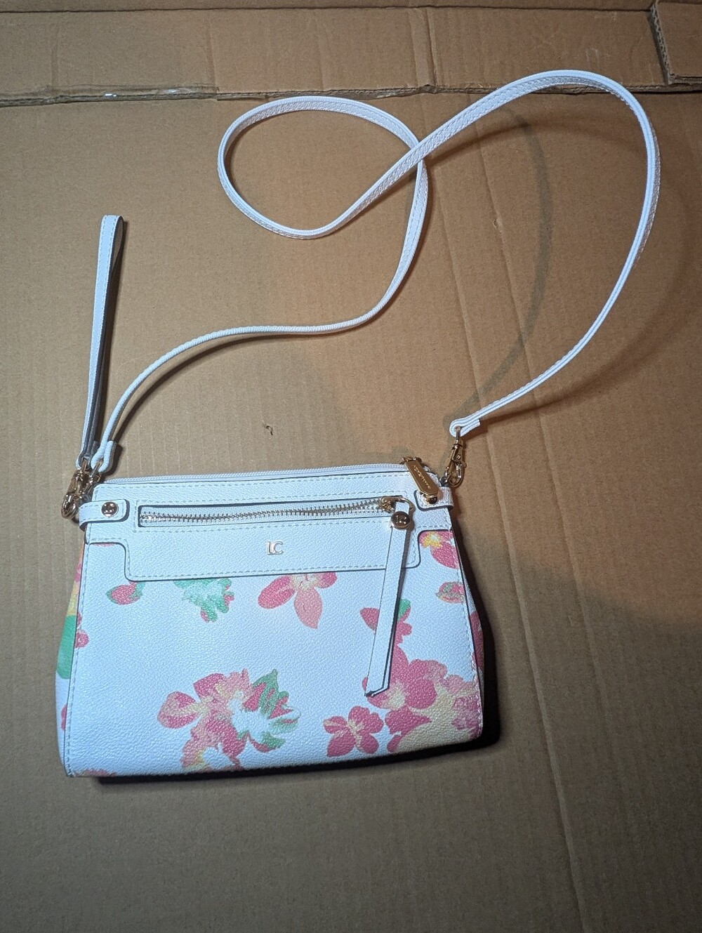 Liz Claiborne Watercolor Floral Convertible Crossbody / Wristlet BagDescription: